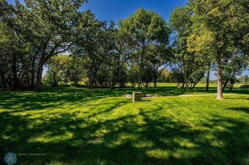 Gorgeous views of the Sheyenne River. Huge backyard for privacy, play, pets, kids, entertaining & more.