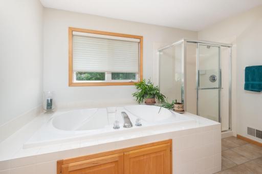 Owner's Bath features separate tub & shower