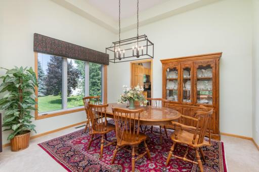 Formal Dining Room with new lighting and walk-thru to the Kitchen