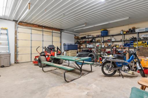 Shed features a concrete floor and 200-amp electrical service.