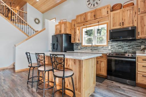 Custom built hickory cabinetry offers both timeless style and exceptional storage.