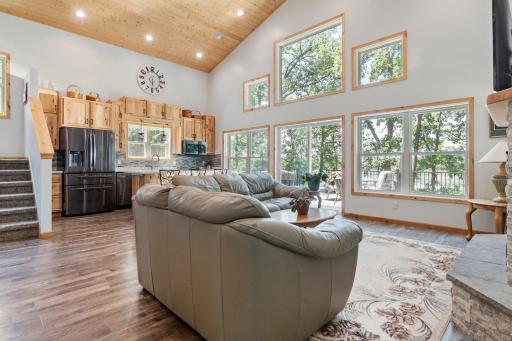 Gleaming LVP flooring flow throughout the main level for a seamless look.