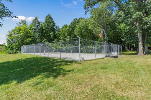 Multi-use court perfect for tennis and basketball games.