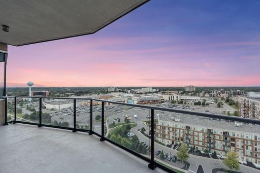 The oversized deck, sheltered by the buildingâs unique design and coverage from above, offers an extension of your living space ideal for both relaxation and open-air entertaining.