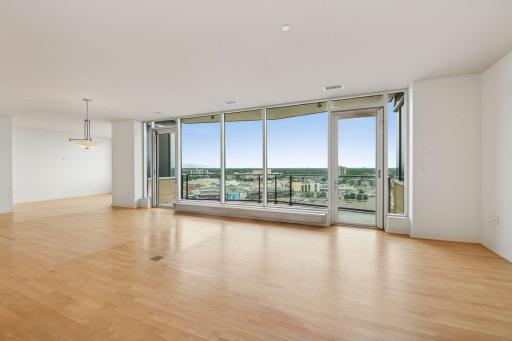 Step inside to a wall of windows with sweeping 14th-floor views and an open airy layout, the perfect welcome home.