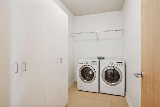 In unit laundry with extra storage or pantry space