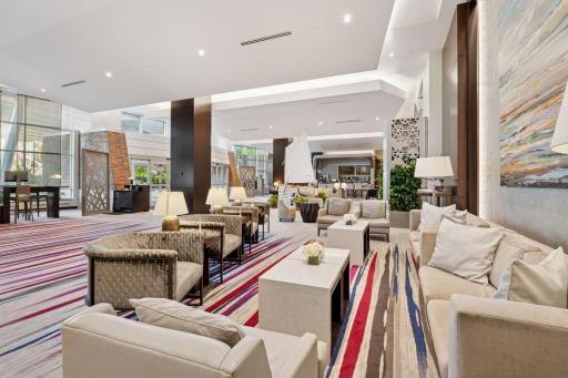 In addition to its stylish gathering areas, the hotel lobby includes a casual window-side work lounge with tables and a printer, perfect for bringing your laptop and staying productive.