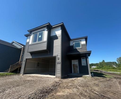 16148 Finale Ave, Hugo - Asphalt Driveway, Sod, and Irrigation are included and to be installed.
