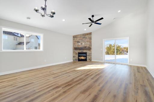 Upgrade to fireplace with brick/stone from floor to ceiling