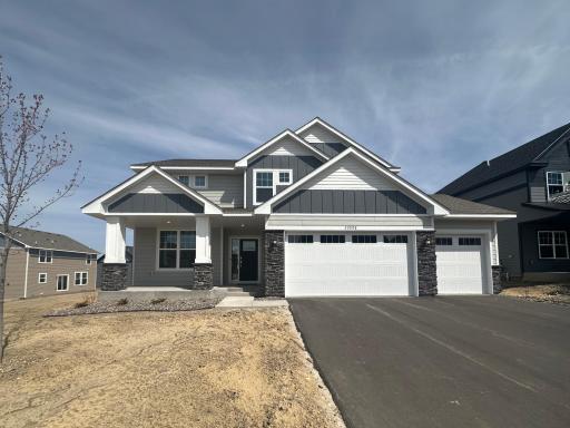Photo is of the actual home. The Lewis has remarkable curb appeal and is sure to impress!