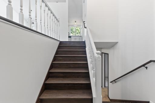 Headed Downstairs To Two More Bedrooms, Family Room and Laundry Room