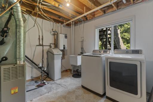 Lower Level Laundry Room With Natural Light & Great View Of The Backyard