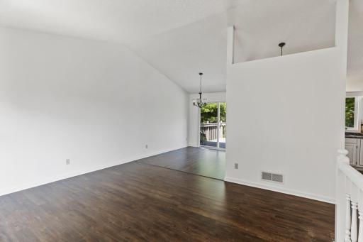 Vaulted Ceilings, New Flooring, Freshly Painted And Wonderful Natural Light