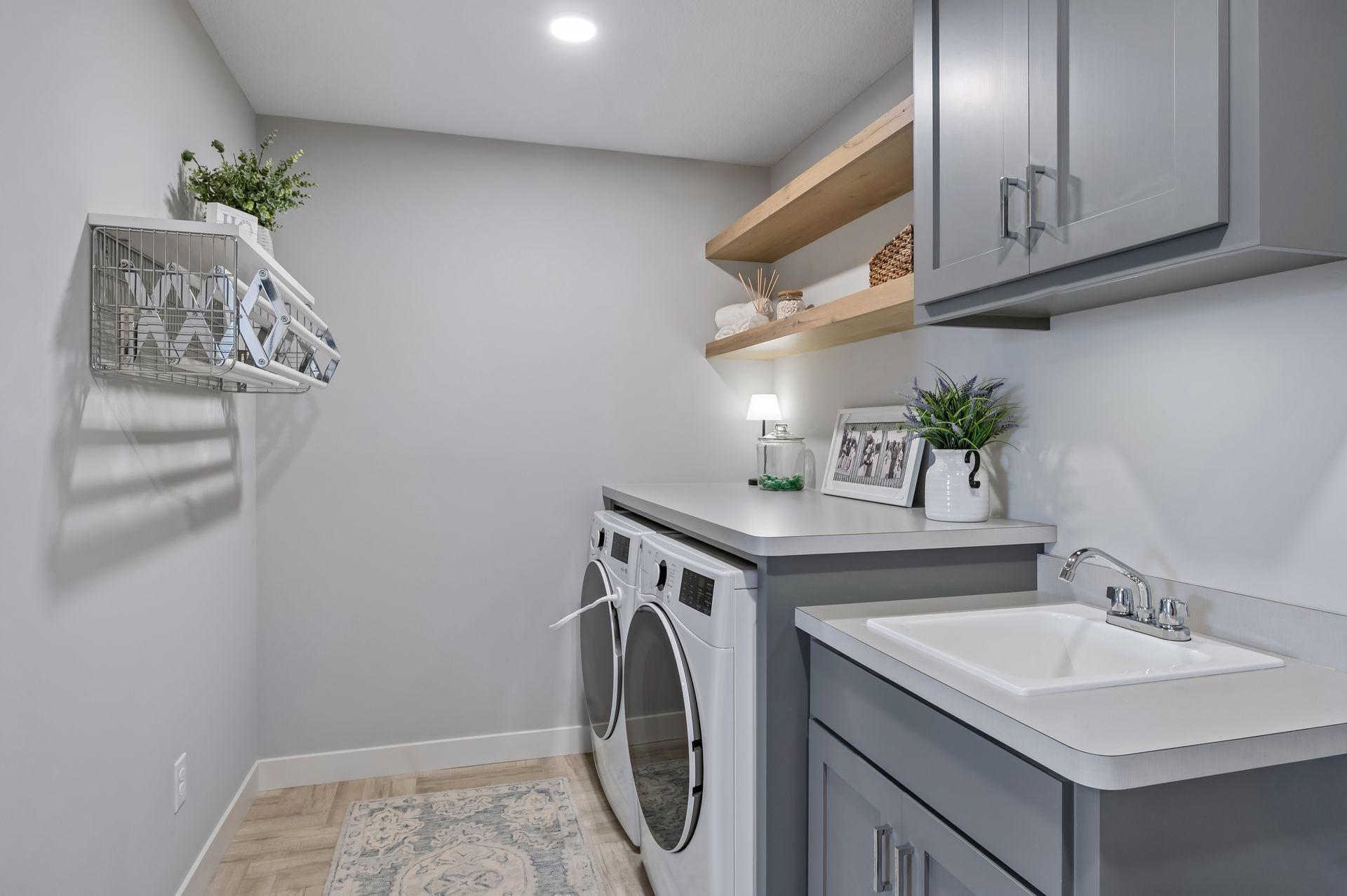 Walk through 2nd level laundry, adjacent walk-in closet