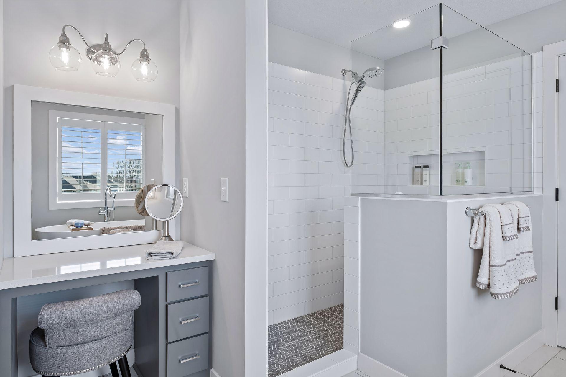 Bonus make-up vanity & glass shower surround