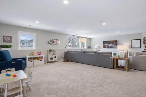 Lower level recreation room has plenty of flex space