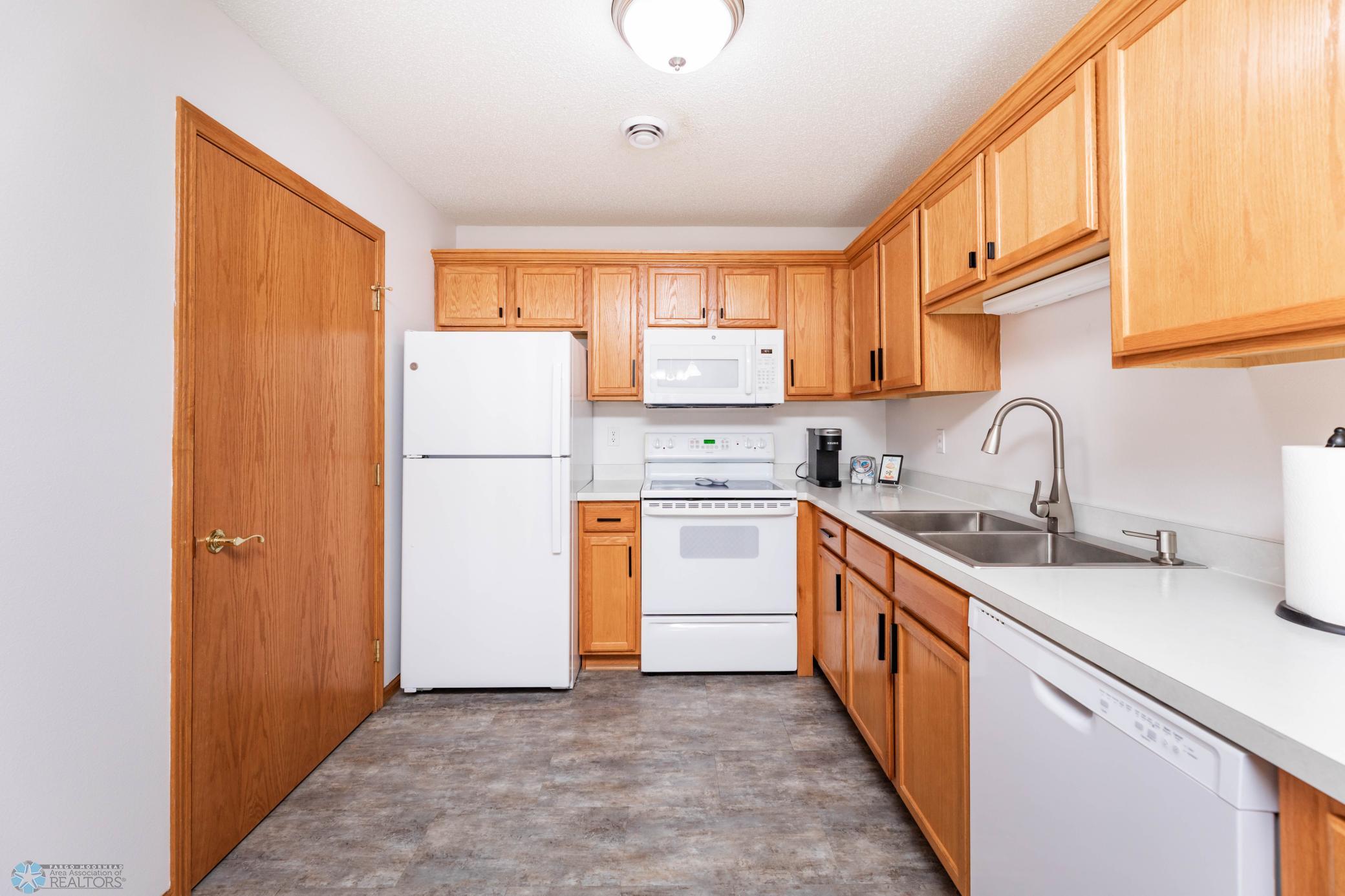 Kitchen with Nice Appliances and Plenty of Cabinets