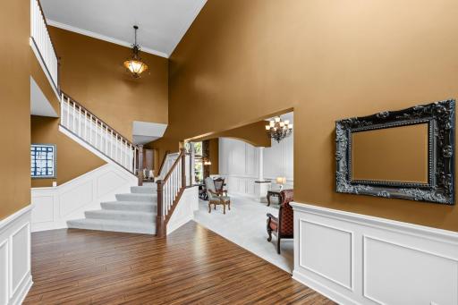 From the moment you walk in, the grand entranceway impresses with its open design, graceful flow, and welcoming atmosphere.
