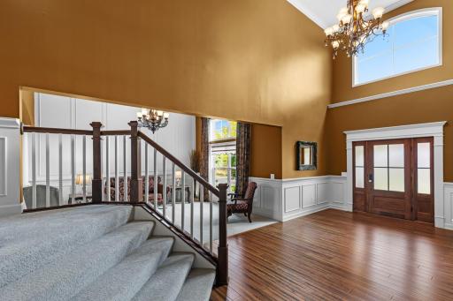 Open and airy foyer with soaring ceilings for a grand first impression.