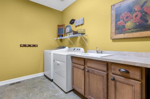 Dedicated main-level laundry room for everyday convenience.