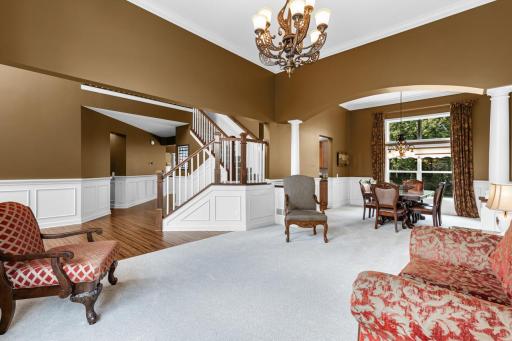 Multiple living and dining spaces provide flexible areas for both formal and informal gatherings.