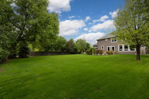 Located beside 4+ acres of serene city-owned wetland for added privacy and tranquility.