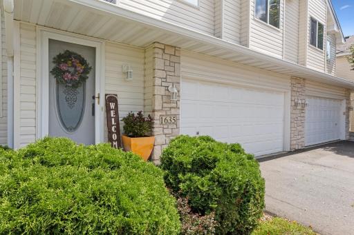 Beautiful end unit townhome with a private backyard!