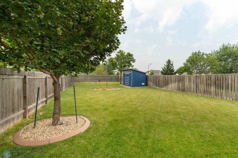 LARGE FENCED IN BACK YARD