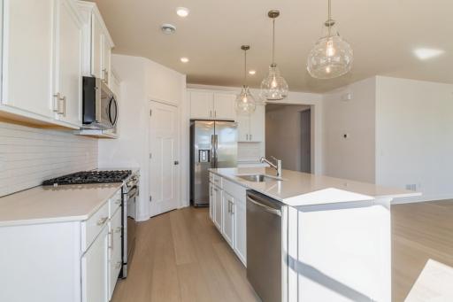(Photo of a similar home, actual finishes may vary)