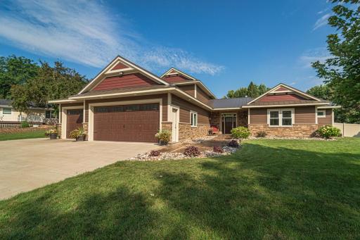 For those still wanting a single-family option, this home offers the perfect combination of main floor living, exquisite CUSTOM HIGH-END FINISHES, your own private yard on a cul de sac setting, plus OVERSIZED GARAGE SPACE and a PARKING PAD.