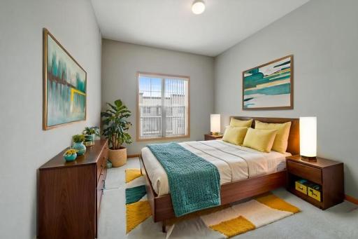 Main bedroom has plenty of room for a king-size bed. (Virtually staged)