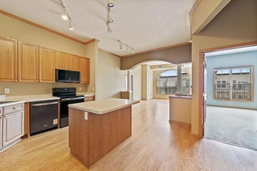 Laminate hardwood flooring throughout the common areas.