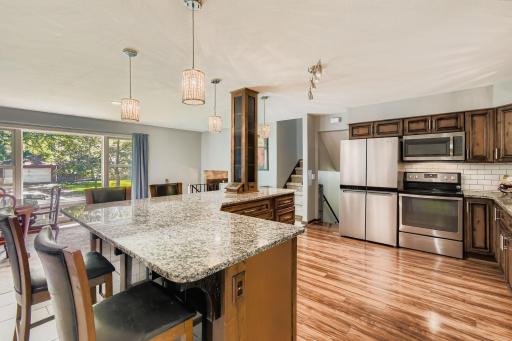 A center island provides additional counter space and the drawers add to the functionality of the design. Which favorite recipe will you prepare first?