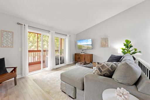 Living room seamlessly flows out to the deck