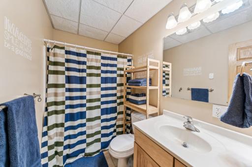 Lower level full bathroom with heated flooring.