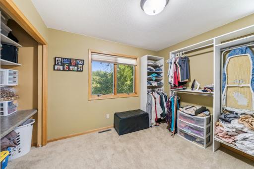 The primary bedroom features a 10X10 walk-in closet with built in shelving.