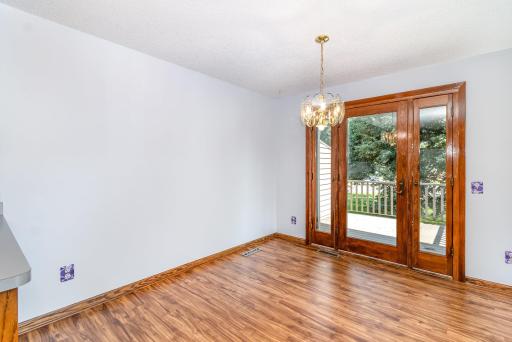 Dining room walks out to maintenance free deck.