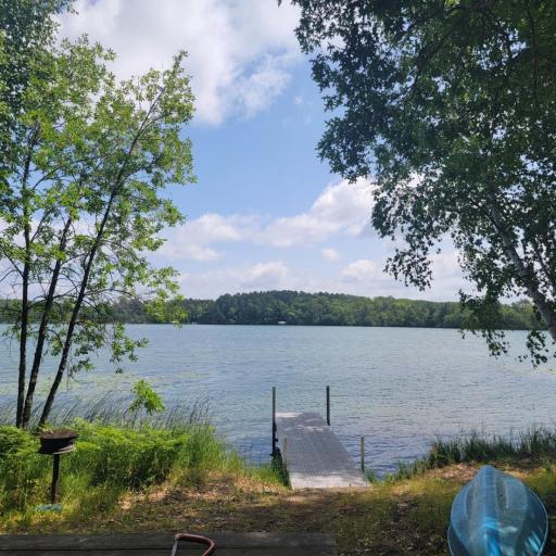 450' of Lakefront on this clean & clear Premier 343.38 acre Big Stony Lake, 5.25 Acre Lot with 3 Log Cabins, Lake mean depth is 10' and Max Depth is 24'