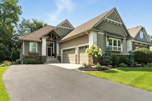 Welcome home to maintenance free living! Rare find- Detached villa with a 3 car garage!!