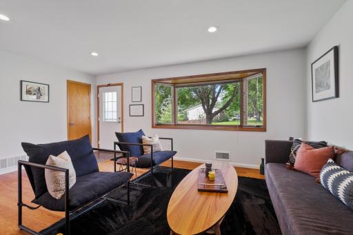 Enjoy the neighborhood when looking out the bay window.
