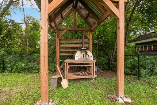 Pizza hut with custom pizza oven will convey with the house.