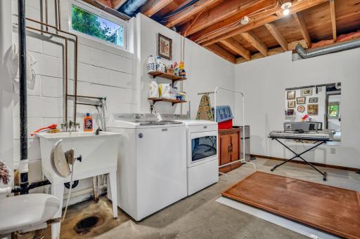 Laundry Room with utility sink and storage. Dance studio? Music?