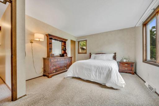 Primary bedroom with ensuite bathroom and walk-in closet.