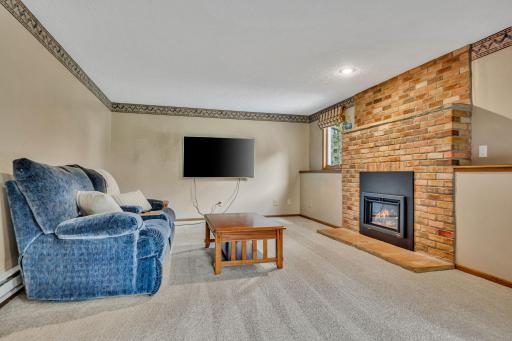 The second gathering room with a gas fireplace...