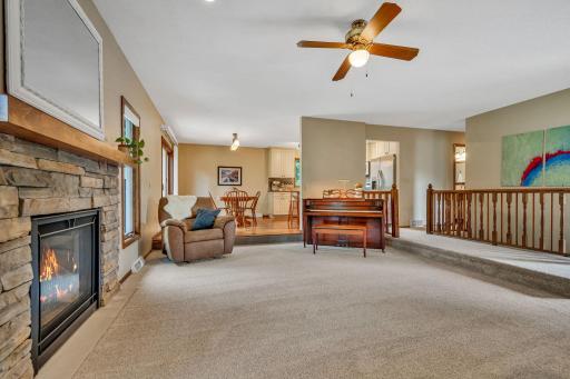 Enjoy multiple gathering areas with TWO gas fireplaces (main and lower levels).