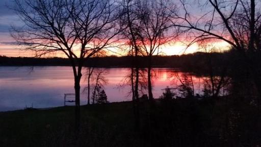 This stunning rambler boasts breathtaking Lake Virginia views, built on one of the neighborhood's widest lots for expansive, single-story living with additional bedrooms and entertainment areas in the Lower level of home.