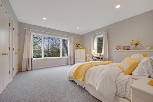 another bedroom in lower level - all 3 bedrooms have views of Lake Virginia. Large spacious closets with plenty of storage