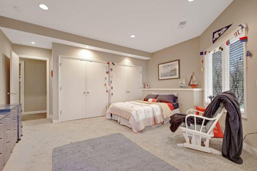 a third lower level large bedroom - the lower level has its own zone heating, separate from the main level. Again, lots of closet space - with views of the lake. The home was custom designed to give all bedrooms views of the lake.