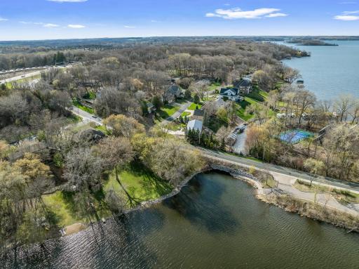 Aerial view of the back yard. Lake Virginia flows into Lake Minnetonka - when the water is low, one can canoe or kayak through the channel onto Lake Minnetonka