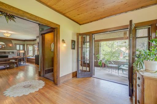 French doors lead to the front porch to bring the outdoors in if you wish